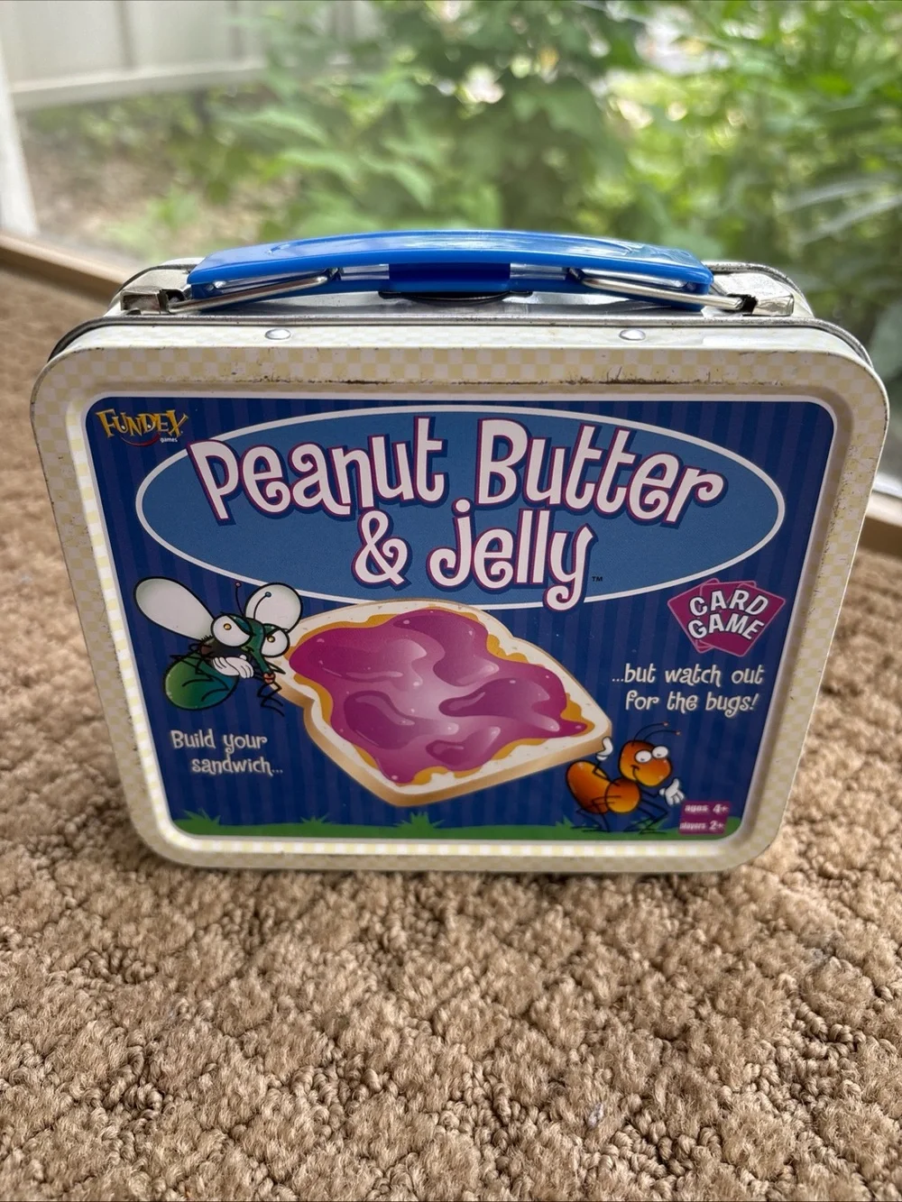 Peanut Butter & Jelly Card Game Tin - closes well but missing closure on case